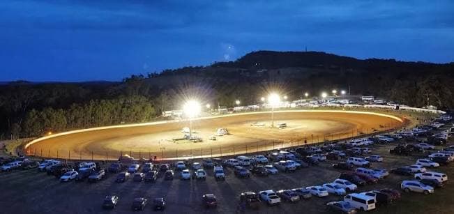 Speedway kart racing under lights